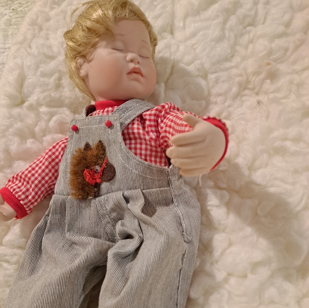 Ashton Drake porcelain doll. 10 inches